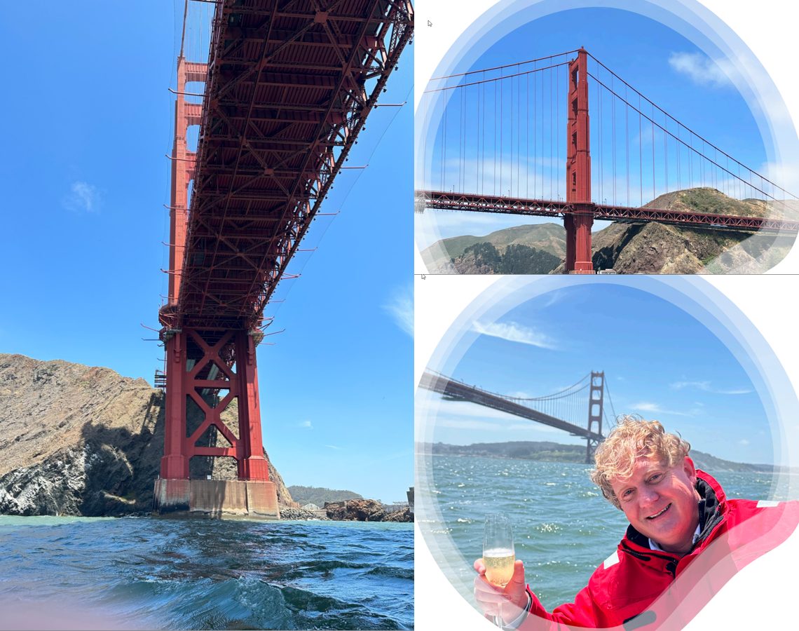 Looking up at the Golden Gate Bridge from the water, and a toast on board